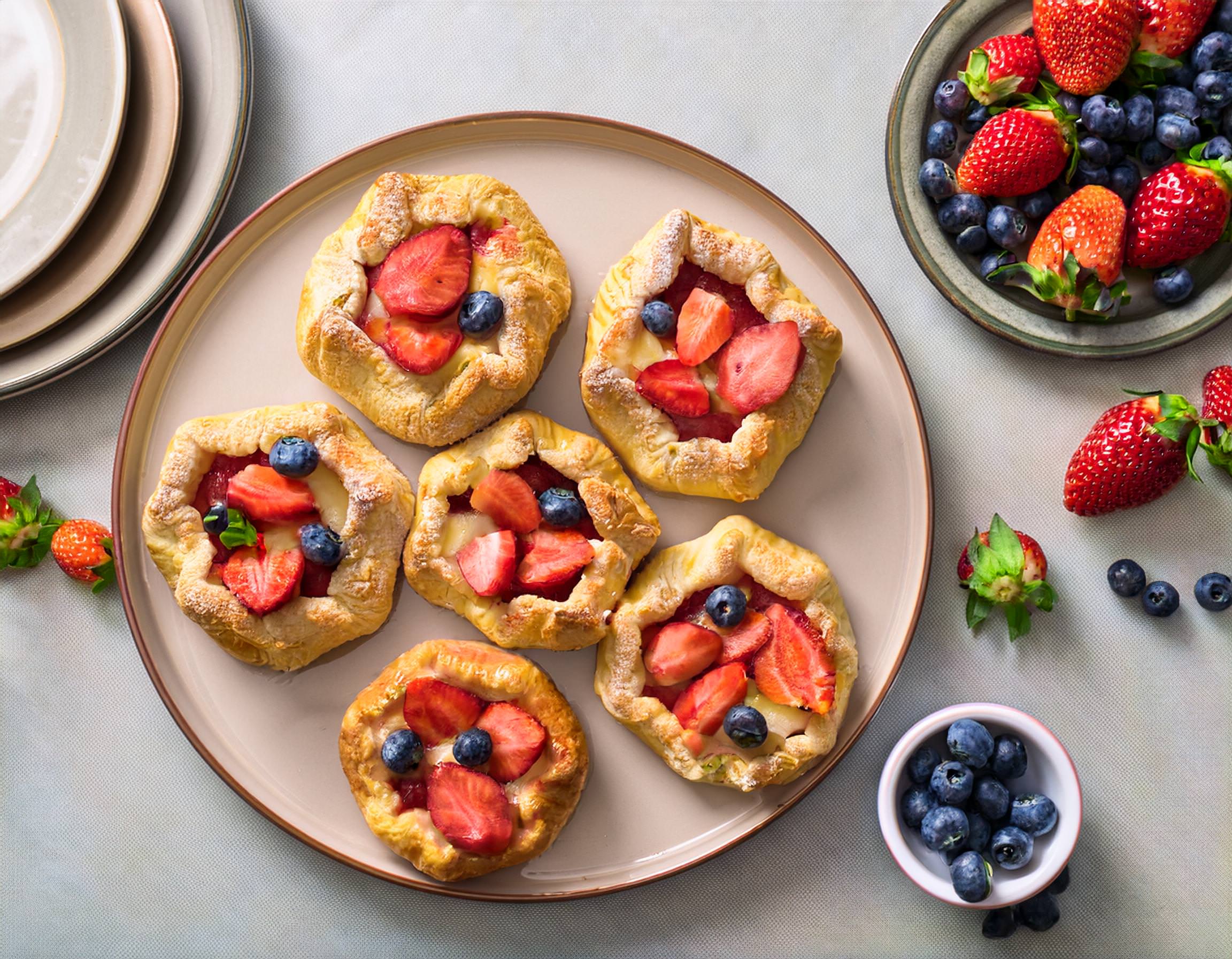 Firefly strawberry rhubarb and blueberry Croustades on a plate on a kitchen table 41085