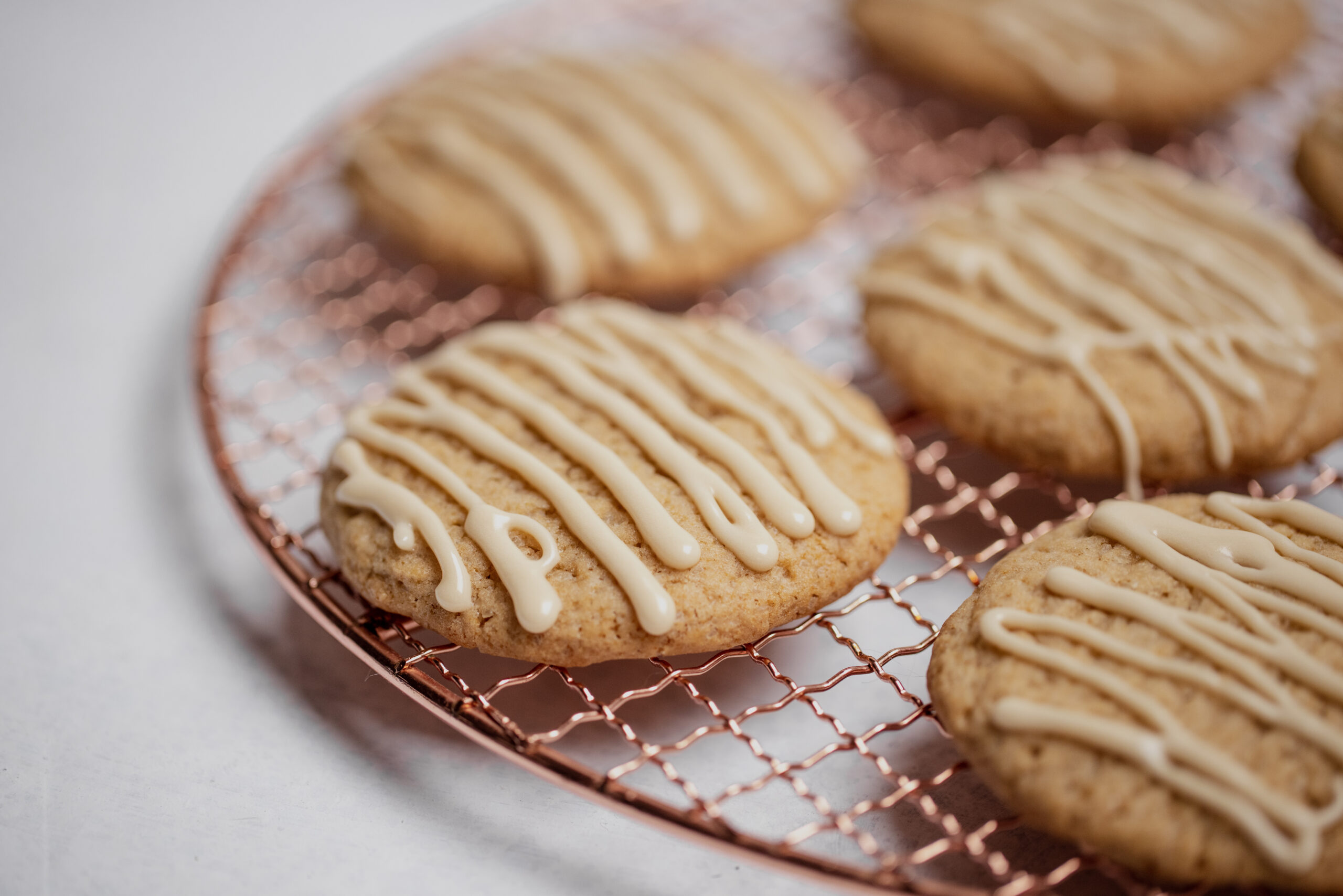 Closeup,Of,Spiced,Cookies,With,Beige,Maple,Icing